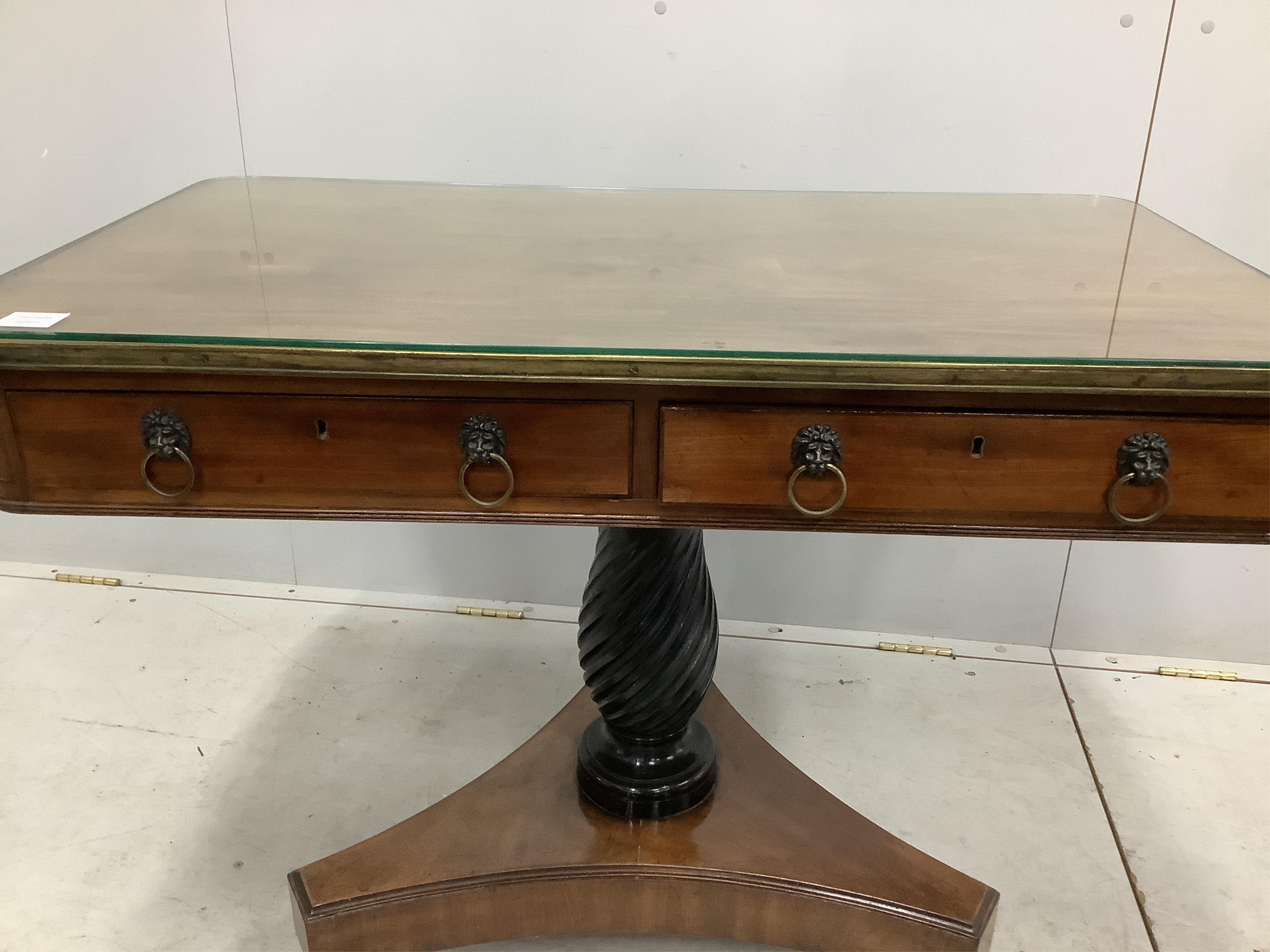 A George IV brass mounted rectangular mahogany two drawer centre table, width 102cm, depth 59cm, height 71cm. Condition - fair